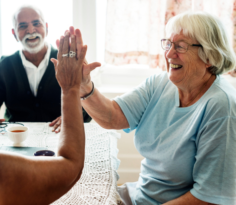 elderly friends celebrating