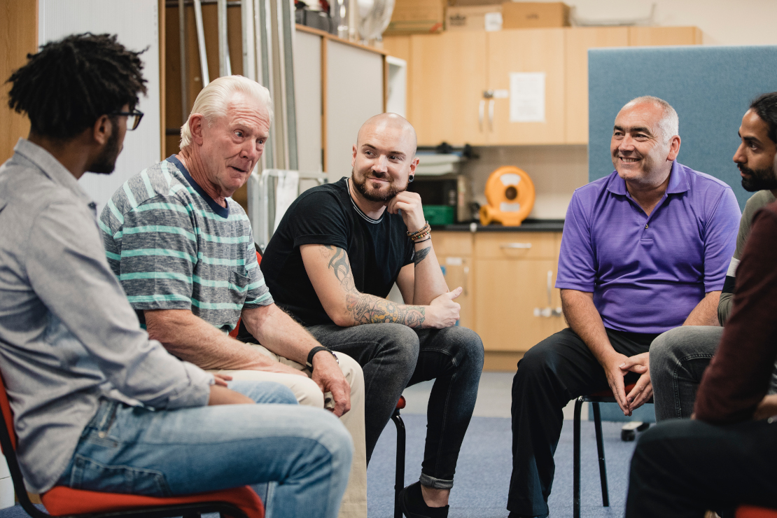group of men meeting in the community
